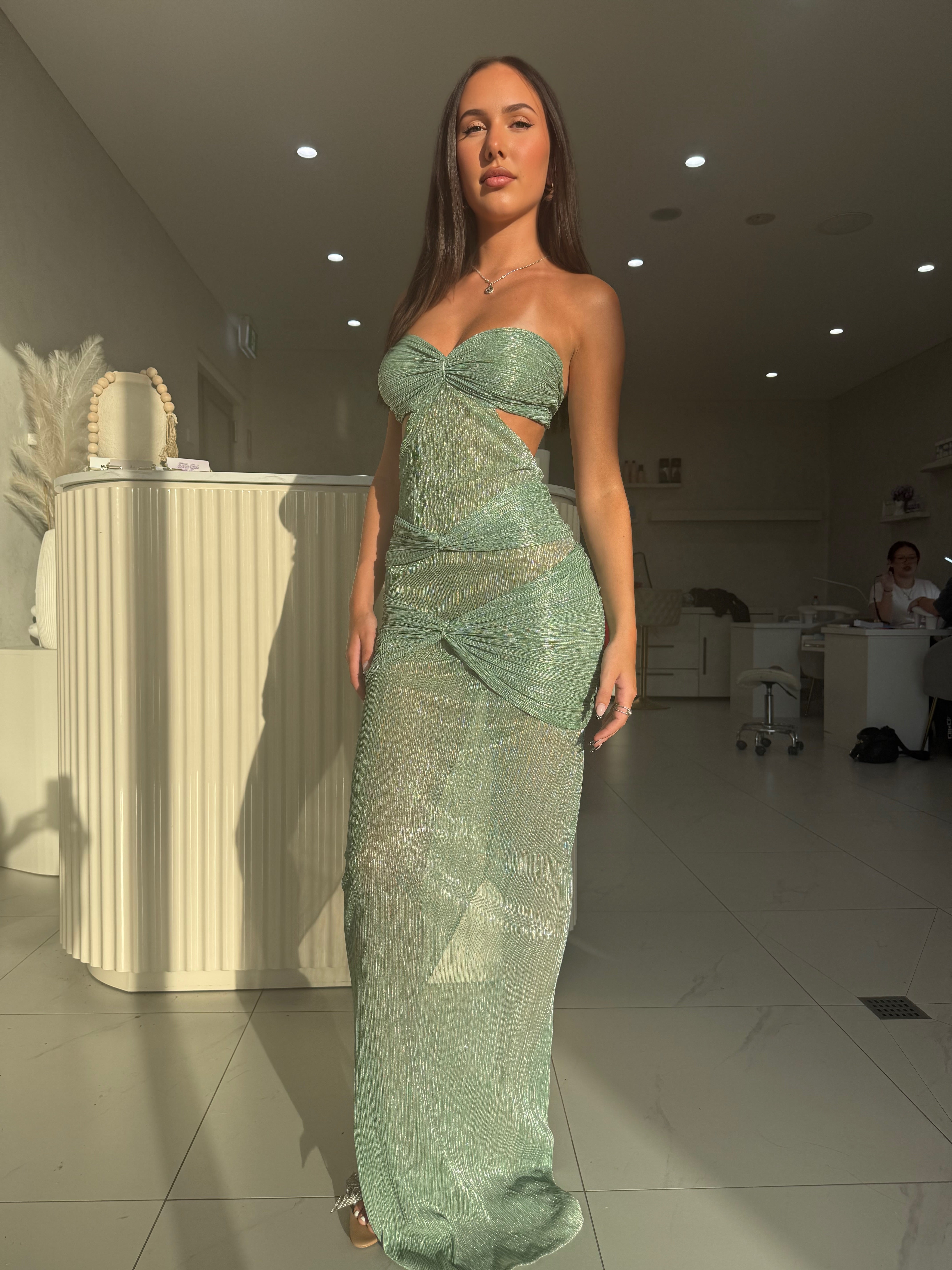 Beautiful model wearing The Paris Dress, by Amy Taylor Collection. Contact us today to order your perfect outfit. 11