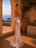  Beautiful model wearing Pure Mermaid Glitter Gown - Rose Gold, by Amy Taylor Collection. Contact us today to order your perfect outfit. 1 