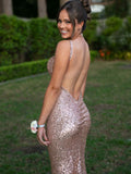  Beautiful model wearing Pure Mermaid Glitter Gown - Gold, by Amy Taylor Collection. Contact us today to order your perfect outfit. 1 
