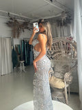  Beautiful model wearing Silver Starlet Gown HIRE, by Amy Taylor Collection. Contact us today to order your perfect outfit. 1 
